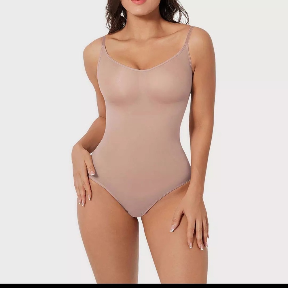 Never worn body suit